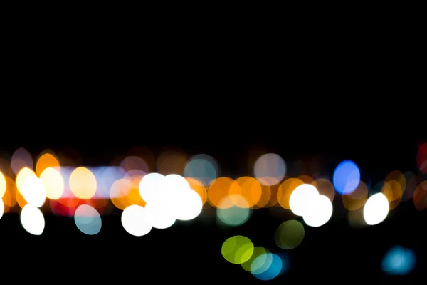 Színes Bokeh vagy blur fény városban az éjszaka — Stock Fotó