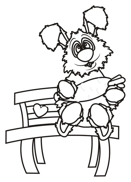 Zajíček zbarvení sedí na lavičce a držení mrkev — Stock fotografie