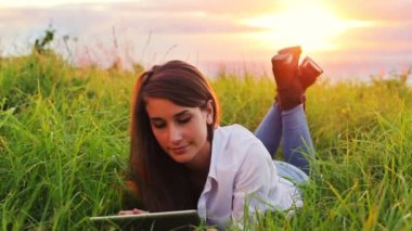 Young Woman Using Tablet Computer Touchscreen.