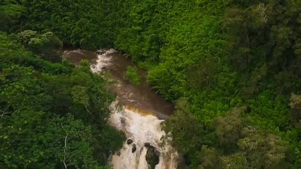 Slow Motion Aerial Revealing Shot of Amazing Powerful Waterfall in Tropical Jungle. — Stock Video