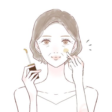 Yüzüne kapatıcı süren orta yaşlı bir kadın. Beyaz bir arkaplanda.