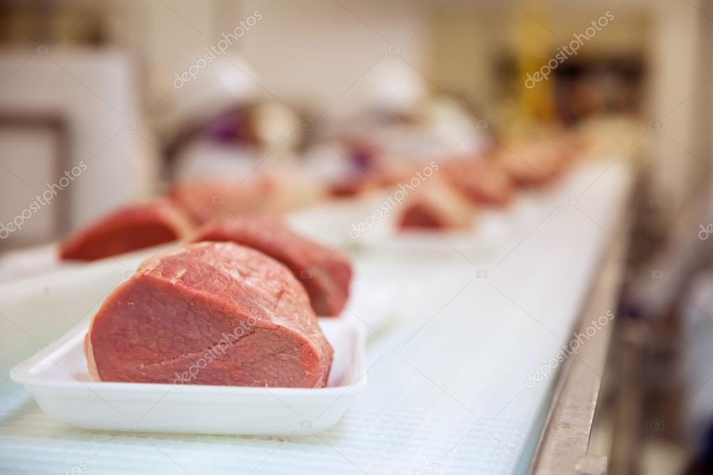 Close up of raw meat red pork uncooked handling Stock Photo by ©elnariz