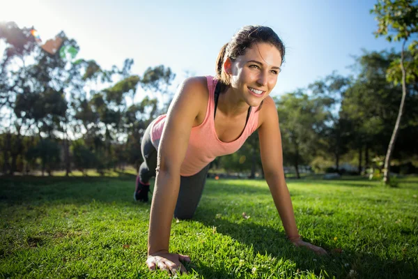 Exercise teacher coach instructor fitness happy smiling outdoors — Stockfoto