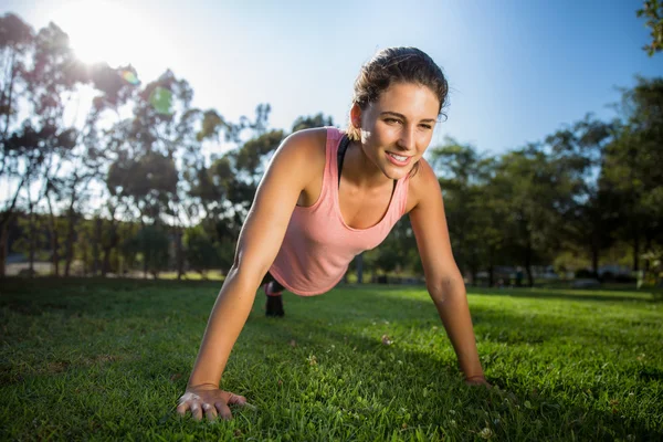 Exercise teacher coach instructor fitness happy smiling outdoors — Stockfoto