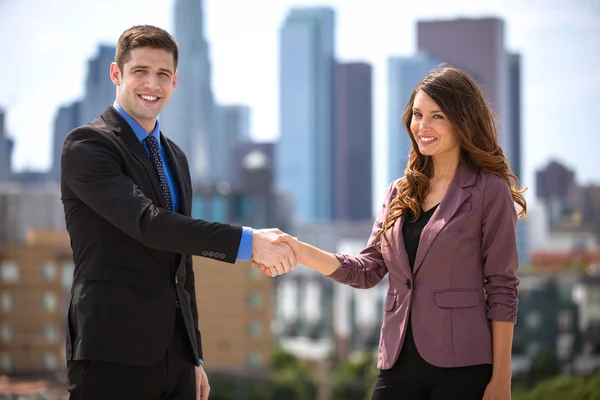 Business colleagues meeting and greeting shaking hands partnership success — Stockfoto