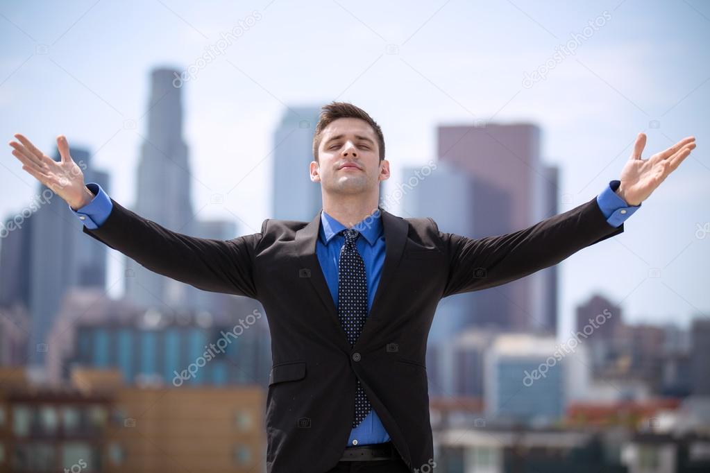 Business man arms raised to the sky successful millionaire CEO leader