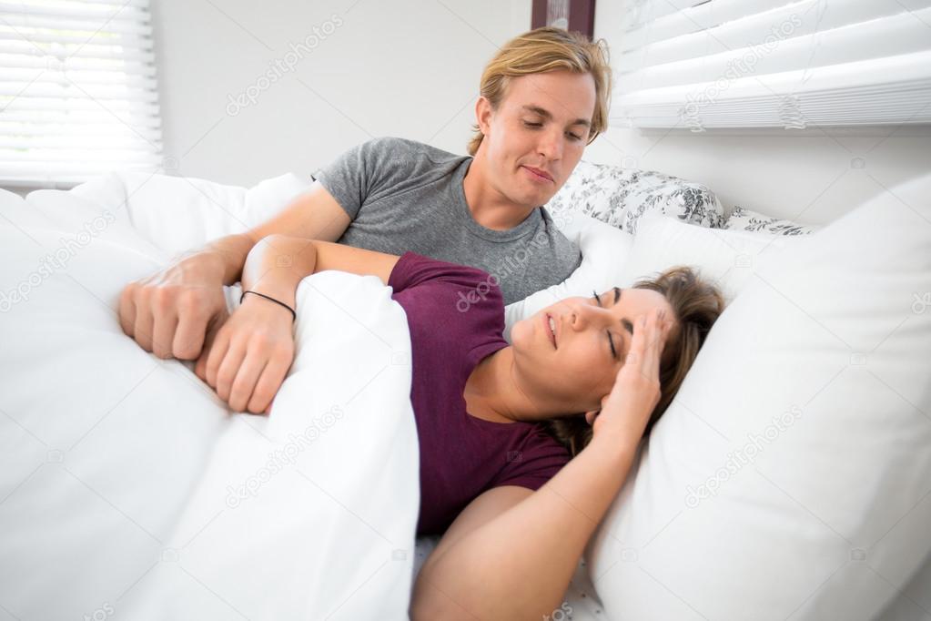 Relationship problems sexual frustration couple in bed argue about lack of intimacy