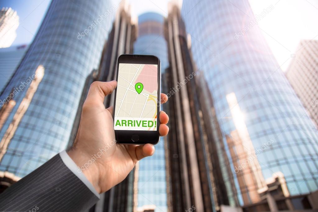 Businessman holding cellphone hand app technology map navigation arrived success city downtown buildings skyscrapers