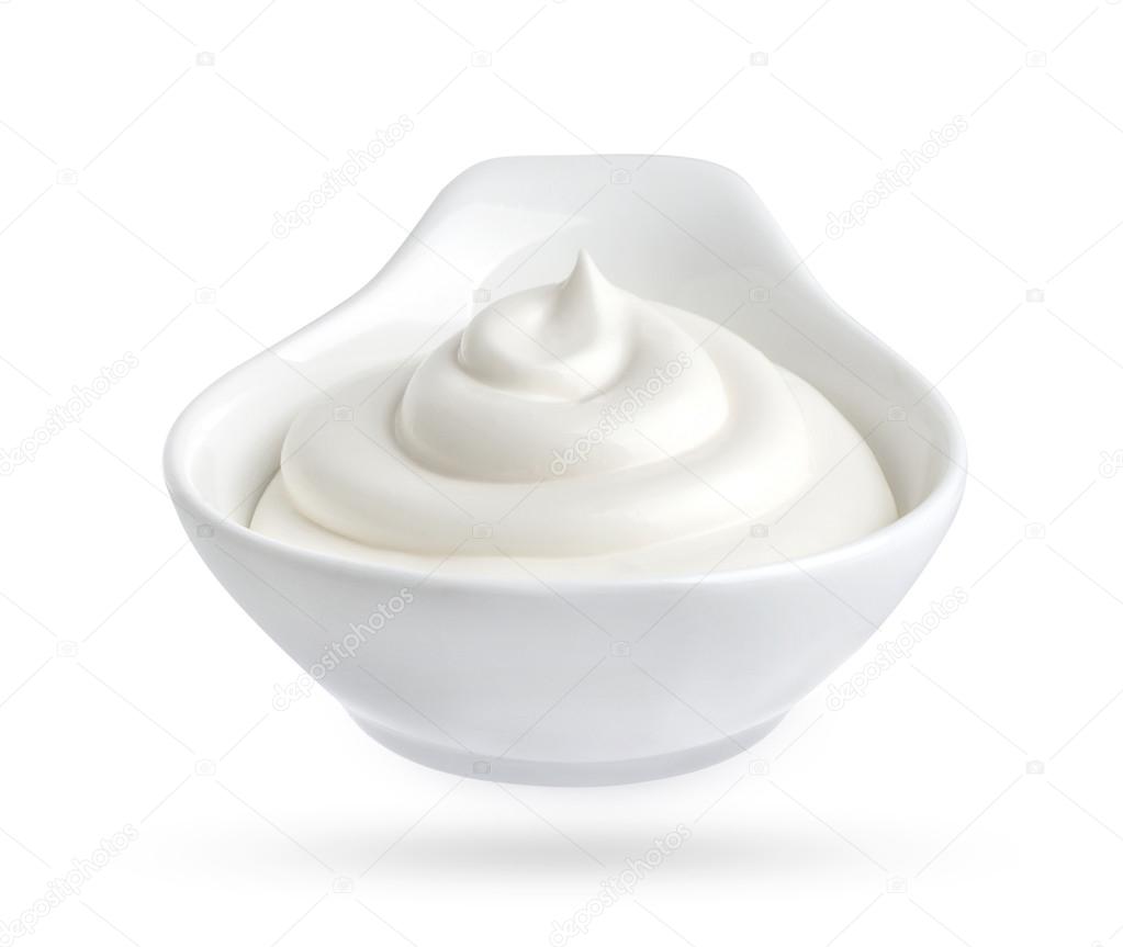Bowl of mayonnaise isolated on white background