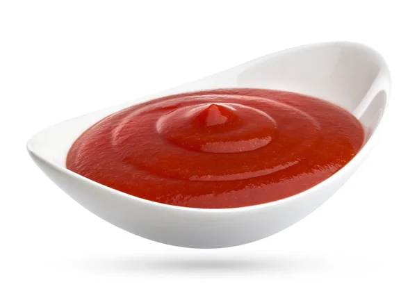 Ketchup aislado sobre fondo blanco. Porción de salsa de tomate . — Foto de Stock