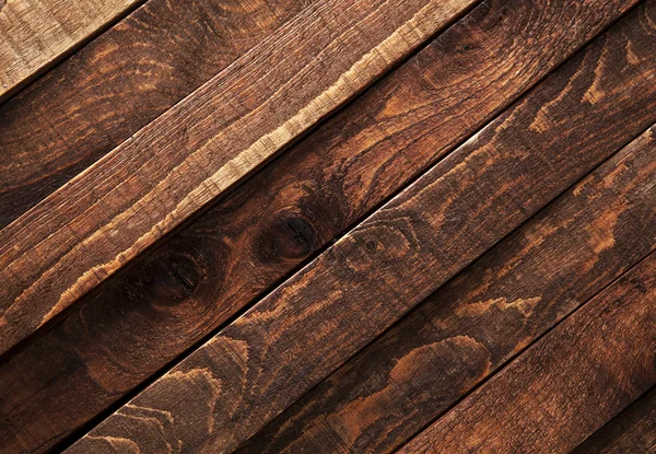 Textura de madera oscura. Fondo diagonal marron tablones de madera vieja . — Foto de Stock