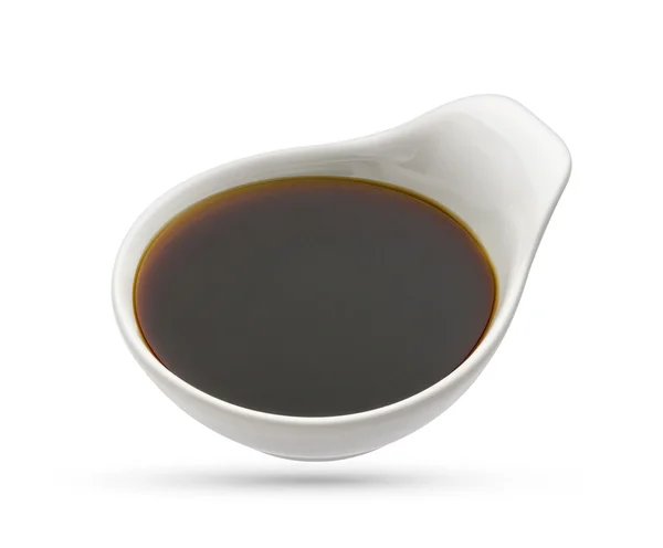 Чаша соєвого соусу ізольована на білому, вид зверху — стокове фото