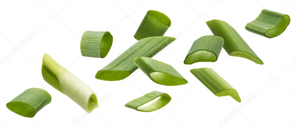 Falling green onion slices, cut chives isolated on white background
