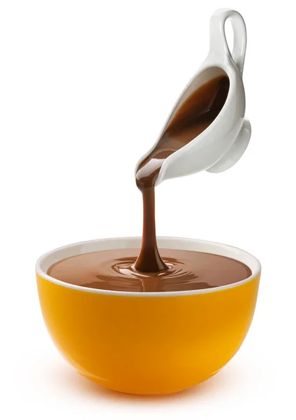 Despejar chocolate derretido isolado no fundo branco — Fotografia de Stock