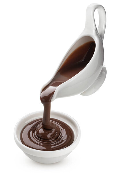 Pouring melted chocolate isolated on white background with clipping path