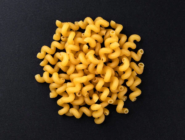 Pile Raw Cellentani Pasta Isolated Black Background Top View — Stock Photo, Image