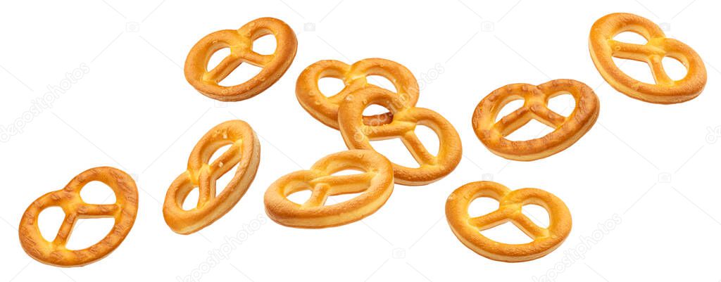 Falling salted pretzels isolated on white background with clipping path
