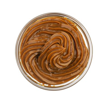 Kaynamış yoğunlaştırılmış süt, erimiş karamel kreması, üst manzara.