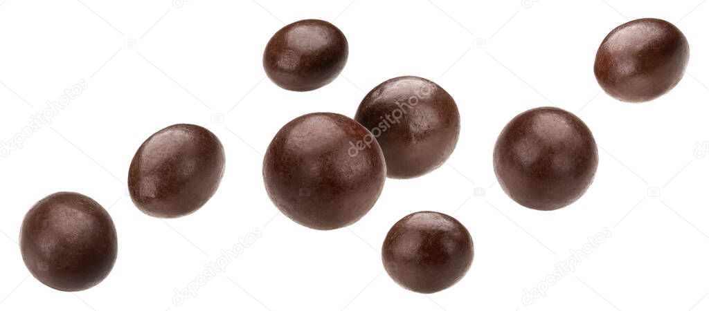 Falling chocolate balls isolated on white background