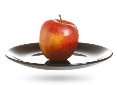 Beyaz üzerine kırmızı elma