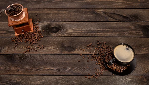 La textura de madera oscura con una taza de café —  Fotos de Stock