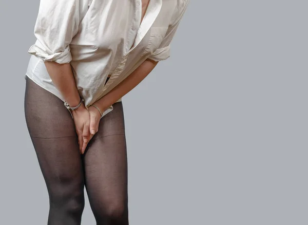 Woman Keeps Her Hands Pressed Lower Abdomen Legs Feels Pain — стоковое фото