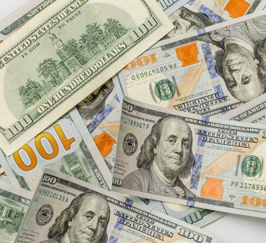 Pile of hundred dollar bills. Pile of one hundred US banknotes. Money background. American hundred dollar bills. Wealth concept.