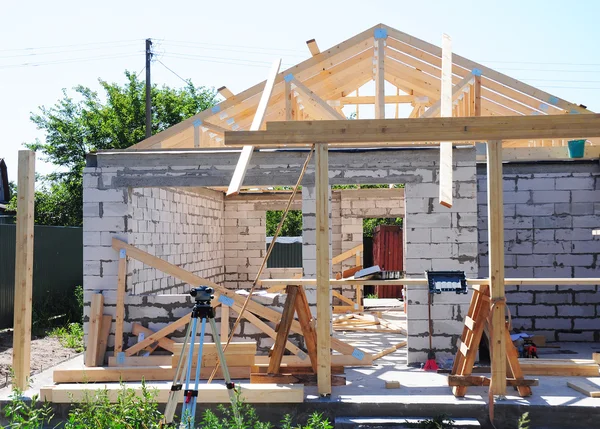 Building New House from Autoclaved Aerated Concrete Blocks with Roofing Construction.