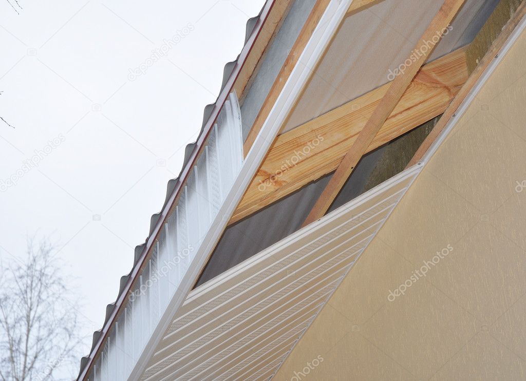 Soffit and Fascia Installation. Roofing Construction.