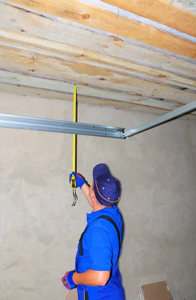 Contractor Measuring Tape Installing Garage Door Post Rail Spring Installation — Stock Photo, Image