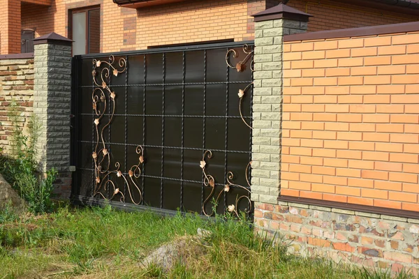 Brick Fence with Gate of Modern Style Design Decorative Brick Wall Surface With Cement.