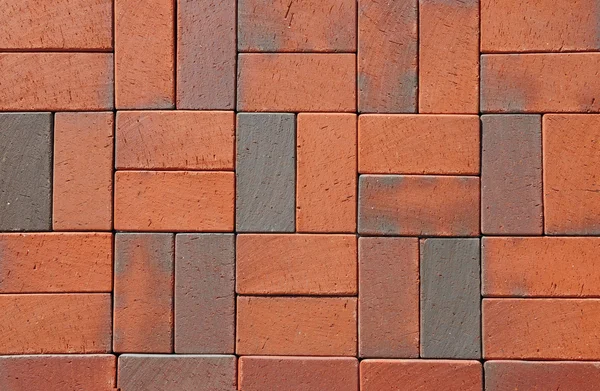 Červené německé keramické slínku dlaždice. Podlahové dlaždice v cestě, detail chodníku chodit — Stock fotografie