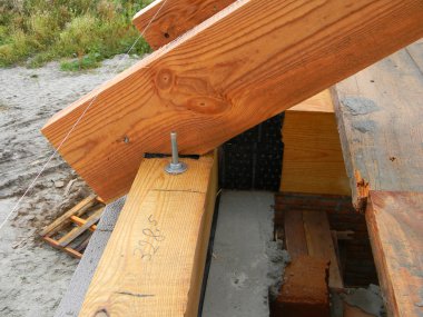 Installation of wooden beams at construction the roof truss system clipart