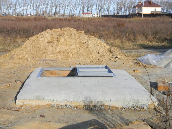 Construction site with manhole water borehole. — Stock Photo, Image