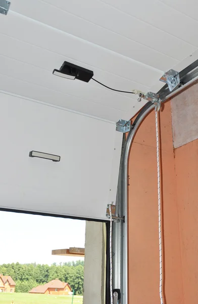 Close up on mechanical garage door opener mechanism. — Stock Image Close up on mechanical garage door opener mechanism. Royalty Free Stock Photos