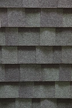 A newly installed composition asphalt shingle roof