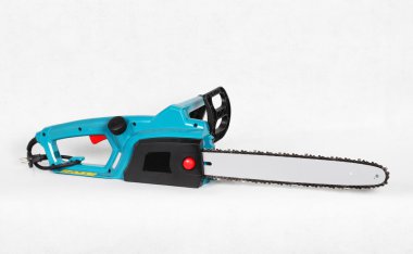 Power tool, electric chainsaw on white background.
