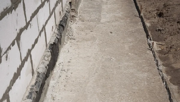 Close up on foundation waterproofing, vapor membrane. Building new house. — 图库照片