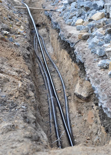 Primer Plano Sobre Cable Eléctrico Las Fibras Ópticas Excavación Sitio —  Fotos de Stock