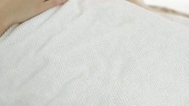 Young girl lie with shugaring above lips in beauty saloon. Cosmetic procedure