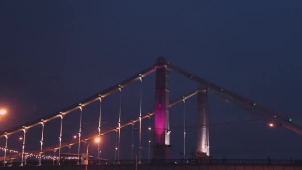 View at huge bridge in city. Dramatic night sky thunderstorm. Lighting flash. Stormy weather. — Stock Video