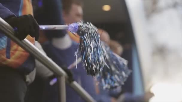 SAINT PETERSBURG, RUSSIA - OCTOBER 27, 2013: Relay race of Olympic flame in Saint Petersburg in October. Supporters in bus wave pom pom. Uniform. — Stock Video