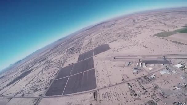 Skydiver fly on parachute above Arizona. Sunny day. Extreme sport. Landscape — Stock Video