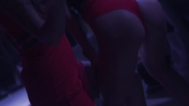 Dj girl and mc girl dance at turntable in nightclub. Wave booty. Illuminations — Stock Video