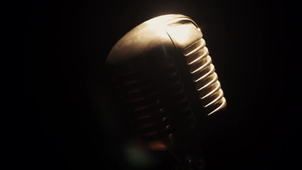 Concert vintage microphone stay on stage in empty club under bright spotlight — Stock Video