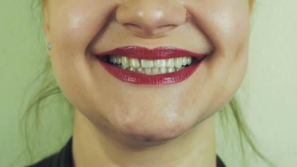 Woman with red pomade send air kiss in front camera. Mouth. Teeth. Smile. — Stock Video