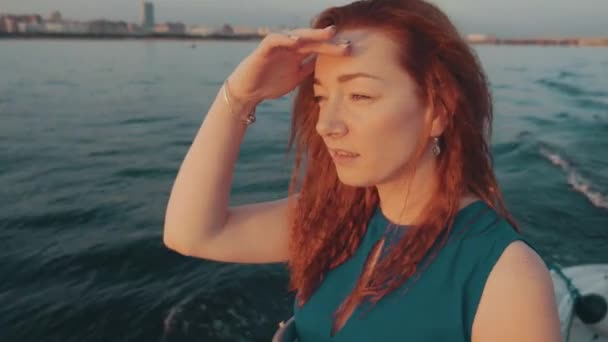 Girl in turquoise dress sail on motor boat. Summer sunset. Romantic. Landscape — Stock Video
