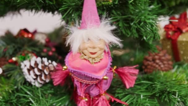Decoration of Christmas tree witch doll toy. Pan — Stock Video