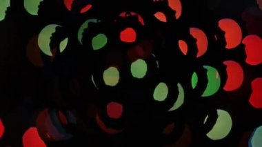 Siyah arka plan üzerine soyut ışıklar bokeh. Şekil