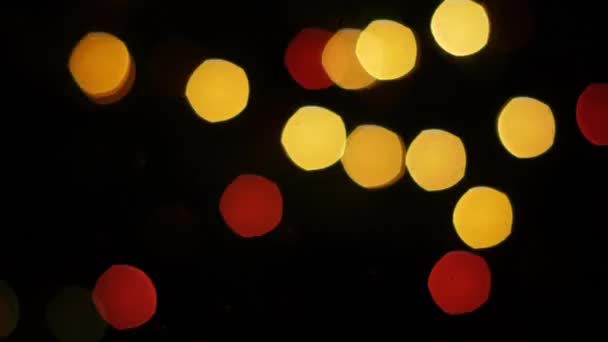 Luces coloridas bokeh sobre fondo negro. Estático — Vídeo de stock